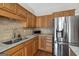 Kitchen featuring stainless steel appliances, tile backsplash, and granite countertops at 11 Chad Ct, Mcdonough, GA 30253