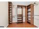 Well-organized walk-in closet with shelves and hanging rods for ample storage at 11 Chad Ct, Mcdonough, GA 30253