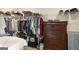 A walk-in closet with ample storage space, shelving, and hanging racks at 845 Graeme Dr, Mcdonough, GA 30252