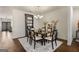Elegant dining room features a stylish chandelier and neutral decor at 845 Graeme Dr, Mcdonough, GA 30252