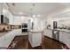 Modern kitchen features granite countertops and stainless steel appliances at 845 Graeme Dr, Mcdonough, GA 30252
