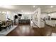 Spacious open-plan living area boasts hardwood floors and modern finishes at 845 Graeme Dr, Mcdonough, GA 30252