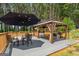 Spacious deck area with stylish seating and dining options, perfect for outdoor entertaining at 845 Graeme Dr, Mcdonough, GA 30252