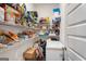 Walk-in pantry with abundant shelving, providing ample storage space at 845 Graeme Dr, Mcdonough, GA 30252