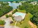 Aerial view of a community pool with ample seating, a lake view, and accessible parking at 845 Graeme Dr, Mcdonough, GA 30252