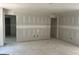 Spacious open-concept living area with multiple entryways to other rooms at 5565 Hwy 155 N, Stockbridge, GA 30281