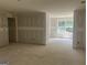 Open living room area with large window offering lots of natural light at 5565 Hwy 155 N, Stockbridge, GA 30281