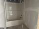 New bathroom with a bathtub, ready for its finishing touches, offering relaxation and comfort at 5565 Hwy 155, Stockbridge, GA 30281