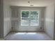 Unfinished bedroom showcasing a large window and natural light at 5565 Hwy 155, Stockbridge, GA 30281