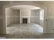 Spacious living room with arched entryways and a fireplace, perfect for gatherings at 5565 Hwy 155, Stockbridge, GA 30281