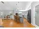 Modern kitchen with hardwood floors, pendant lighting, and stainless steel appliances at 152 Bear Creek Rd, Moreland, GA 30259