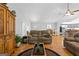 Cozy living room with hardwood floors, neutral walls, and open access to the modern kitchen at 152 Bear Creek Rd, Moreland, GA 30259