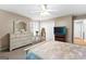 Bright main bedroom with neutral walls, carpet floors, with plenty of natural light at 152 Bear Creek Rd, Moreland, GA 30259