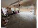 Spacious two car garage featuring an open door and storage space at 145 Mill Run, Fayetteville, GA 30214