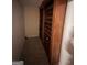 Home wine cellar with custom wood shelving for storing wine at 145 Mill Run, Fayetteville, GA 30214