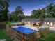 Aerial view of a home showcasing a large pool and a fenced backyard at 234 Crumbley Rd, Mcdonough, GA 30252