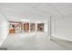 Spacious unfinished basement area ready to be customized with stairs and a brick fireplace at 234 Crumbley Rd, Mcdonough, GA 30252