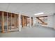 Unfinished basement with exposed framing and concrete walls and floor at 234 Crumbley Rd, Mcdonough, GA 30252