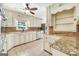 Updated kitchen with granite countertops, stainless steel appliances, and custom cabinets at 234 Crumbley Rd, Mcdonough, GA 30252