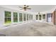 Sun-drenched room with carpet, brick wall, lots of windows offering backyard views at 234 Crumbley Rd, Mcdonough, GA 30252