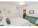 Comfortable bedroom featuring a bright sunny window, ceiling fan and en suite at 1166 Virginia Avenue Northeast Ne Ave # 8, Atlanta, GA 30306