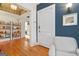 Welcoming entryway showcasing hardwood floors, a decorative shelf, and natural light at 1166 Virginia Avenue Northeast Ne Ave # 8, Atlanta, GA 30306