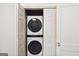 Convenient in-unit laundry closet with stacked washer and dryer, maximizing space at 1166 Virginia Avenue Northeast Ne Ave # 8, Atlanta, GA 30306