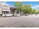 This is an image of the street in front of several local businesses and parked vehicles at 1166 Virginia Avenue Northeast Ne Ave # 8, Atlanta, GA 30306