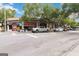Street view with local businesses, parked cars, and pedestrian crosswalk at 1166 Virginia Avenue Northeast Ne Ave # 8, Atlanta, GA 30306