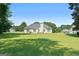 Large, well-maintained backyard with lush green grass at 1032 Shumard Ln, Mcdonough, GA 30252