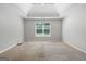 Spacious bedroom featuring neutral walls and carpet at 1032 Shumard Ln, Mcdonough, GA 30252