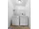 Laundry room features a white washer and dryer at 1032 Shumard Ln, Mcdonough, GA 30252