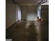 Spacious two-car garage, ready for parking and storage solutions at 7471 Garnet Dr, Jonesboro, GA 30236