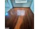 Living area boasting hardwood floors, large window and classic trim and moulding at 7471 Garnet Dr, Jonesboro, GA 30236