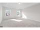 Large bedroom with tray ceiling, large bright windows and neutral decor at 4464 Eastbrook Pl # 56B, Snellville, GA 30039