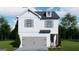 Charming two-story home featuring a gray garage door, complemented by a landscaped front yard and neutral-toned shutters at 4464 Eastbrook Pl # 56B, Snellville, GA 30039