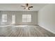 Bright and open living area with large windows and light-filled space at 4464 Eastbrook Pl # 56B, Snellville, GA 30039