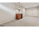 Finished basement featuring a stylish bar area with a mirrored backsplash and modern pendant lighting at 1278 Discover Green Lane Ln # 7, Mableton, GA 30126