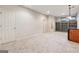Finished basement featuring neutral paint, plush carpeting, built-in shelving, and ample living space at 1278 Discover Green Lane Ln # 7, Mableton, GA 30126
