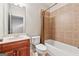 Cozy bathroom with a combination bathtub and shower with a tiled backsplash and a vanity with a wooden cabinet at 1278 Discover Green Lane Ln # 7, Mableton, GA 30126