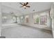 Large bedroom featuring an expansive mirror wall that amplifies the natural light from multiple windows at 1278 Discover Green Lane Ln # 7, Mableton, GA 30126