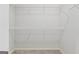 A well-organized walk-in closet with wire shelving for ample storage space and efficient organization at 1278 Discover Green Lane Ln # 7, Mableton, GA 30126