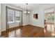 Bright dining room featuring hardwood floors and large windows at 1278 Discover Green Lane Ln # 7, Mableton, GA 30126