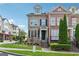Attractive multi-story townhome with brick and siding exterior and well-manicured landscaping at 1278 Discover Green Lane Ln # 7, Mableton, GA 30126