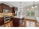 Spacious kitchen featuring stainless steel appliances and a granite-topped center island at 1278 Discover Green Lane Ln # 7, Mableton, GA 30126
