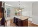 Kitchen with stainless steel appliances, granite countertops, and a decorative accent wall at 1278 Discover Green Lane Ln # 7, Mableton, GA 30126