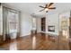 Cozy living room with hardwood floors, fireplace, and recessed shelves for a comfortable ambiance at 1278 Discover Green Lane Ln # 7, Mableton, GA 30126