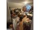 Attic filled with boxes, furniture, and various items, covering the floor and obscuring the space at 733 Stonehaven Chase, Mcdonough, GA 30253