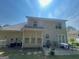 Backyard view with a patio, outdoor furniture, and well-maintained lawn area at 733 Stonehaven Chase, Mcdonough, GA 30253