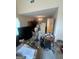 Spacious living area featuring high ceilings, large windows and neutral carpeting at 733 Stonehaven Chase, Mcdonough, GA 30253